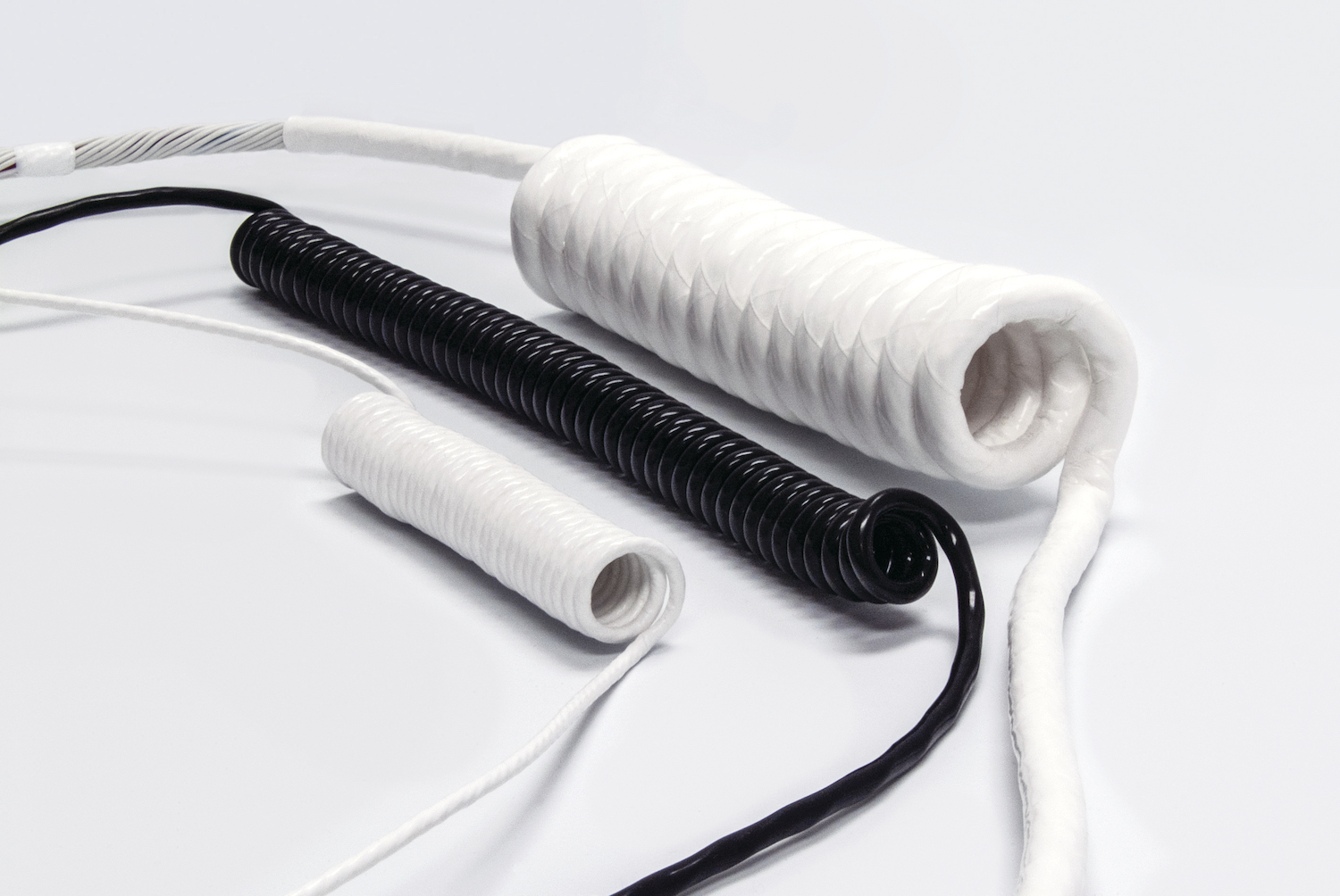 CarlisleIT Coil Cord solutions offer cable management via neat, coiled packaging
