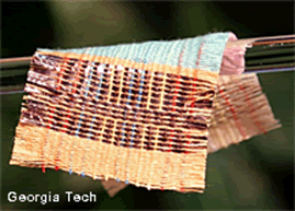 A woven fabric that can harvest energy from light as well as movement