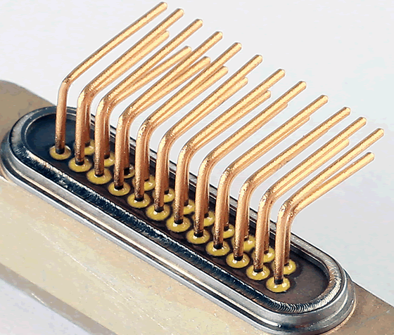 Yellow ceramic-to-metal seals surround high-reliability BeCu pins in a hermetic Micro-D connector.